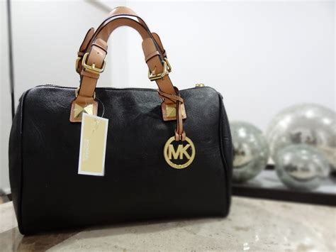 Bolsa Michael Kors: Sua Marca Exclusiva .